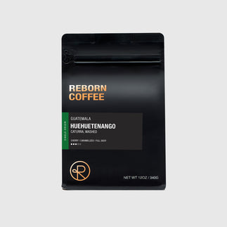 12oz bag of Guatemala, Huehuetenango single origin Reborn Coffee whole beans.