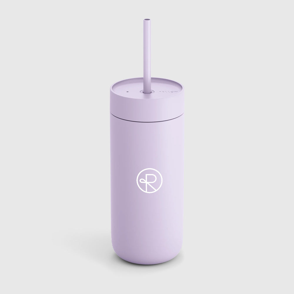 Lavender colored Fellow tumbler with lavender colored plastic straw, has Reborn Coffee circular logo imprinted on it. 1 of 4.