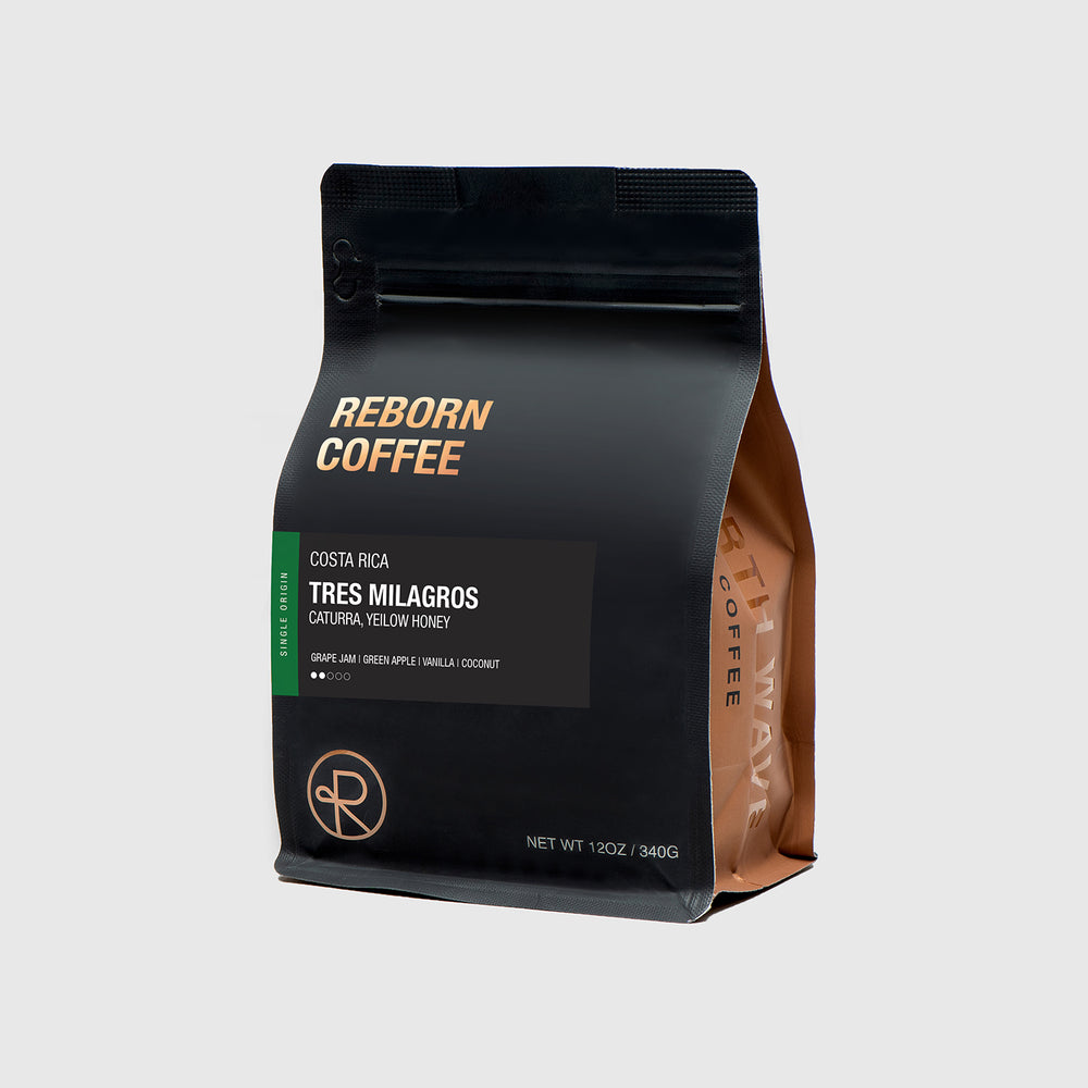 Reborn Coffee 12 oz coffee bag with information on Costa Rica Tres Milagros coffee beans. 