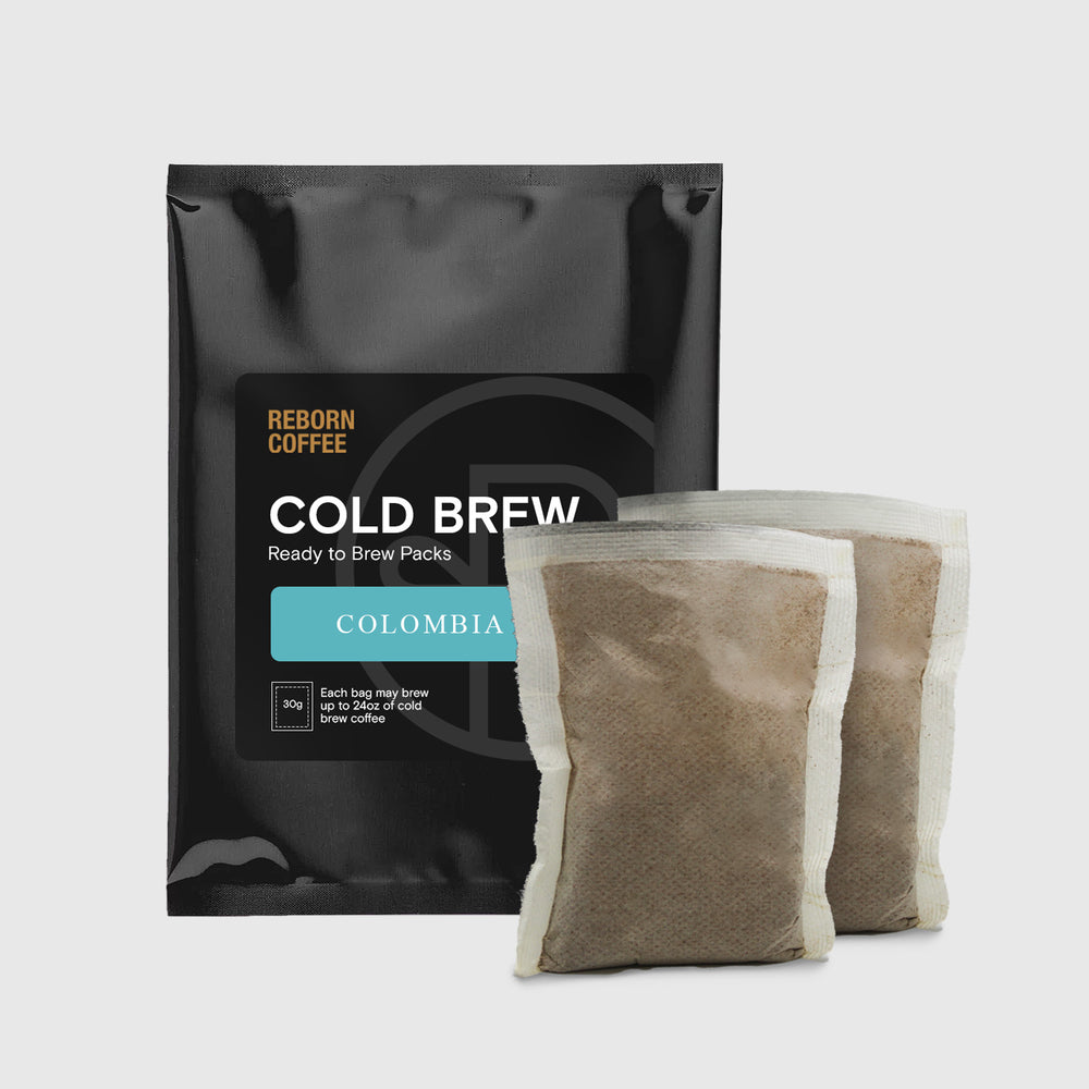 Colombia Cold Brew Pack bag that has a sticker with product information. There are 2 Colombia Cold Brew packs next to the bag. 1 of 9.